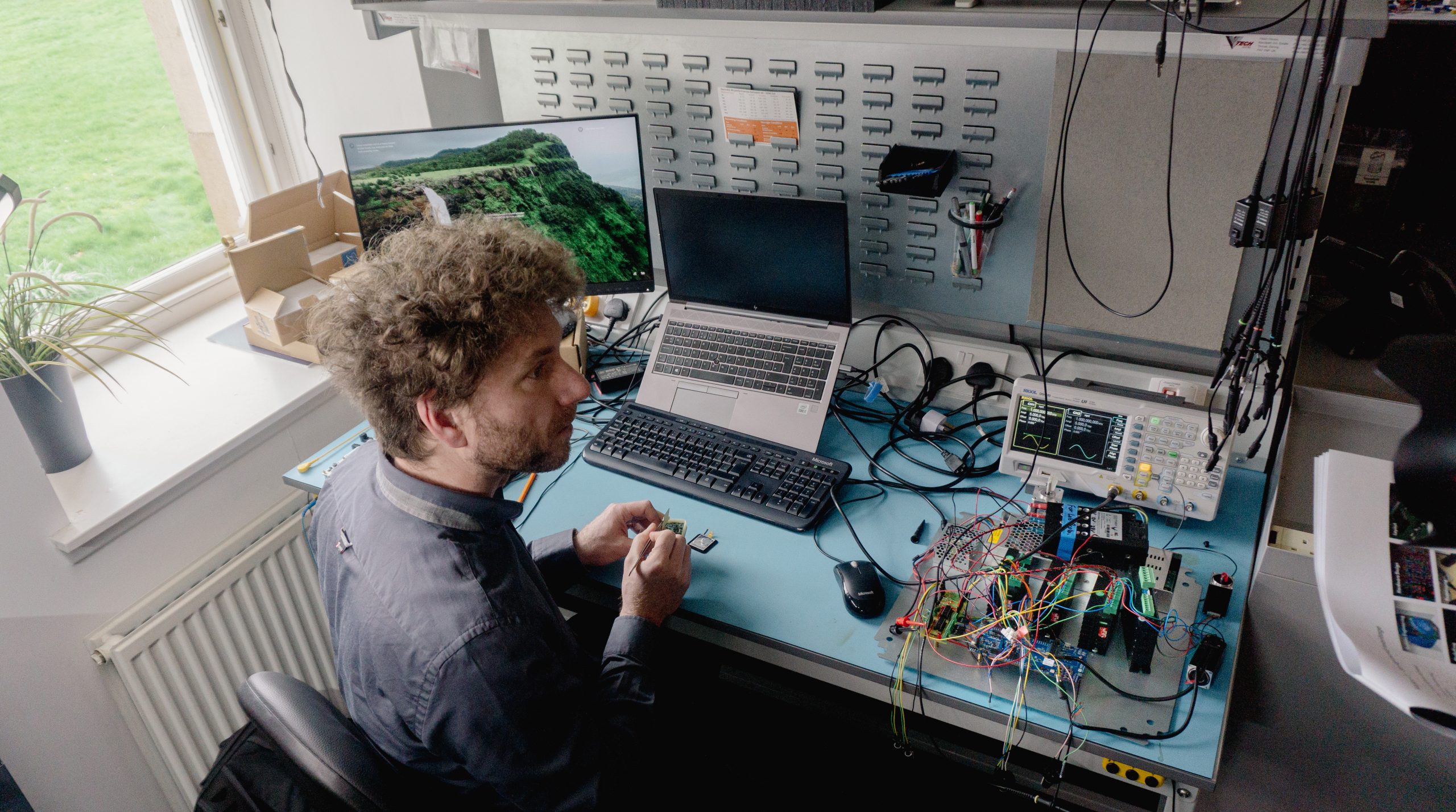i4PD electronics engineer Istvan working on rapid hardware development prototyping